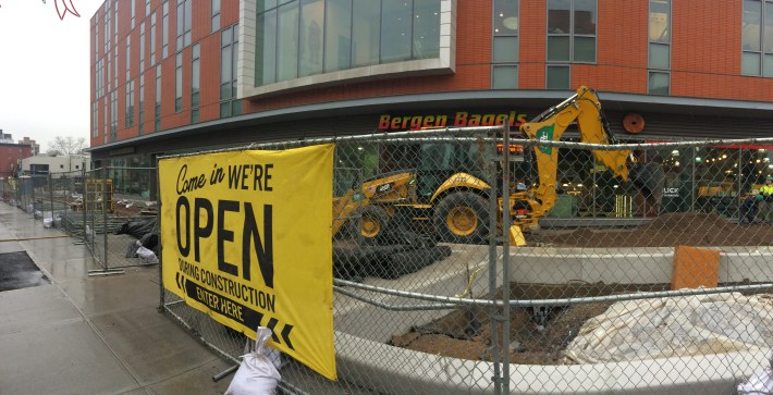 To address falling revenues caused by ongoing plaza construction, the Myrtle Avenue Brooklyn Partnership launched a marketing campaign to alert passersby to the businesses' continued operation. Photo: Myrtle Avenue Revitalization Project