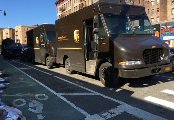 In the past, these trucks would have been double-parked, forcing people on bikes to maneuver around them.