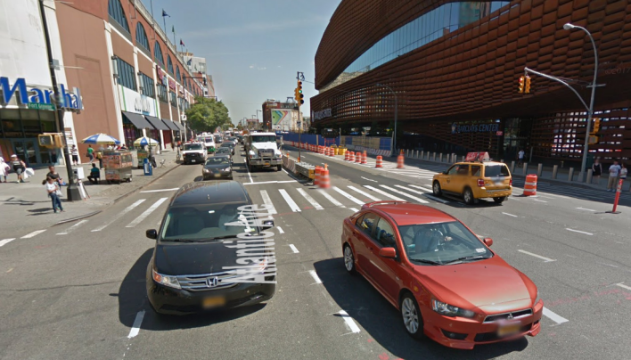 The intersection previously had no median and hard concrete barriers separate each direction of traffic. Photo: Google Maps