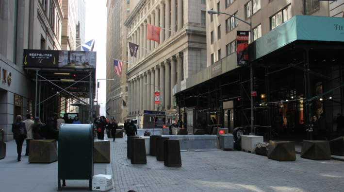 The security checkpoint for motor vehicles at Wall Street and William Street typifies street design around the New York Stock Exchange. It's a accessibility and pedestrian flow nightmare. Photo: Downtown Alliance