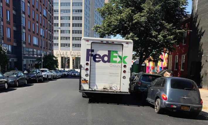 A FedEx truck blocks half of two-way Vanderbilt Avenue in Brooklyn — a bus and bike route. Photo by Gersh Kuntzman.