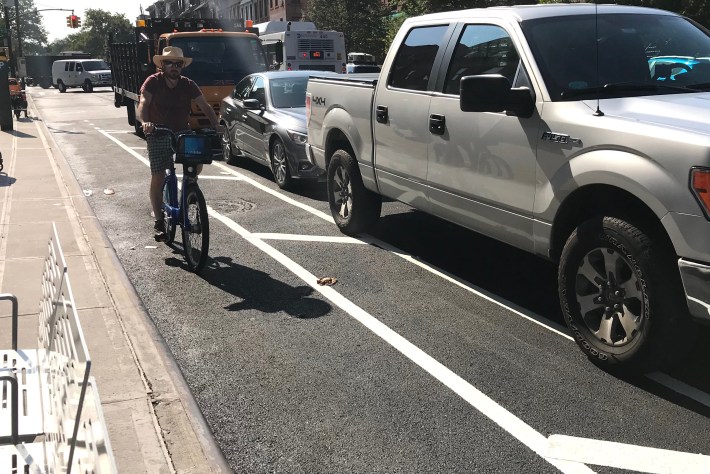 The redesign of Ninth Street in Park Slope has created protected bike lanes on both sides, albeit tighter lanes than others in the city. Photo: Gersh Kuntzman