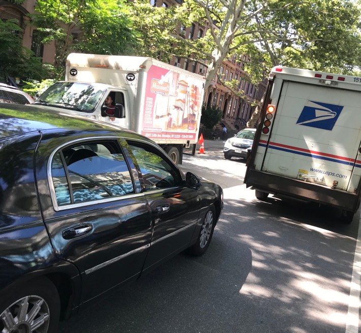 Here's a typical scene on the current Vanderbilt Avenue, where one double-parked truck causes havoc for cyclists and for impatient drivers. Photo: Gersh Kuntzman