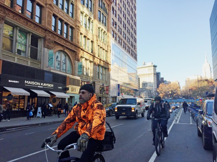 Many cyclists stay on Broadway below 14th Street, despite the danger. Photo: Isaac Blasenstein