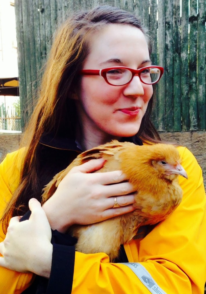 Kiera Feldman headshot with chicken