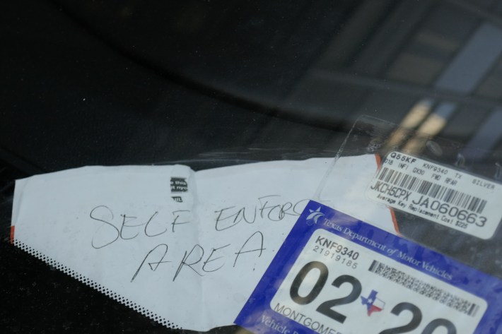 This isn't even a placard. It's a note telling cops not to ticket this car because, well, just don't, ok? Photo: Ben Verde