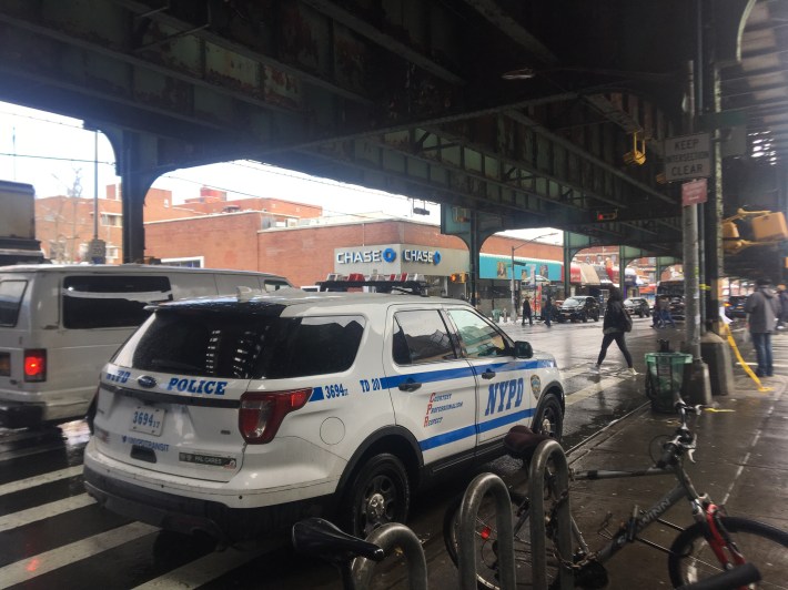 A police car was on the scene of the death on Monday, which likely means cops will be handing out tickets to cyclists for the next three days. Photo: Ben Verde