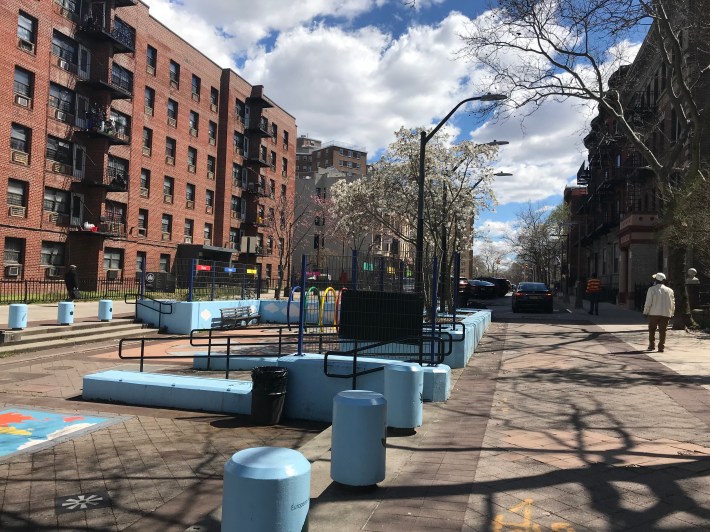 St. Mark's playground in the middle of two parking areas between Albany and Kingston Avenues.