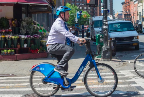 Council Speaker Corey Johnson on a Citi Bike.