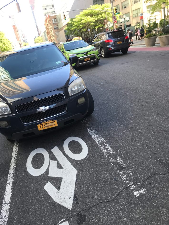 Double- )and in this case, triple-) parked cars line Jay Street. Photo: Gersh Kuntzman