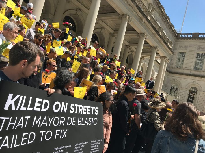 Scores of activists rallied at City Hall last month to argue that Mayor de Blasio has decelerated Vision Zero. Photo: Gersh Kuntzman