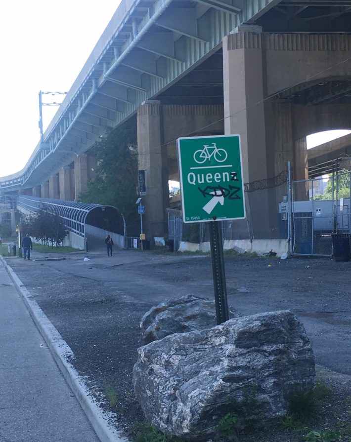You can take your bike to Queens, but you can't ride it over the bridge! Behind the sign is the Randalls Island ramp. Photo: Steve Scofield