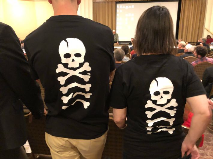 UWS activists wore T-shirts with skulls and bones to protest DOT lack of attention to biking safety.