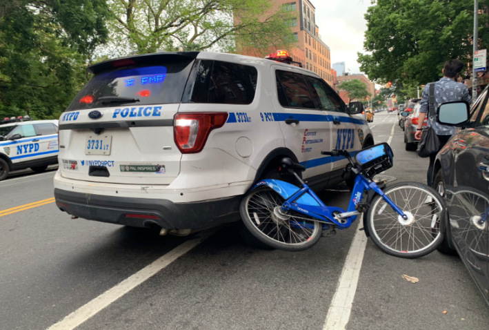 An NYPD officer rammed into a cyclist on Avenue A on Saturday. Photo: Rich Garvey