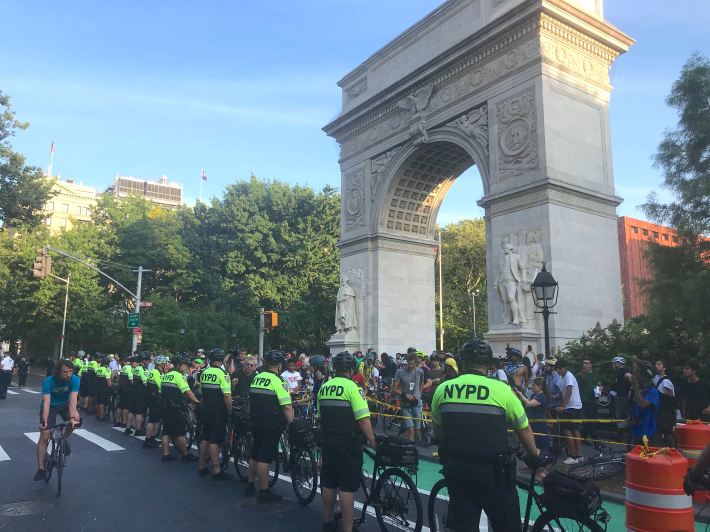 NYPD officers on bicycles formed a phalanx around the protesters.