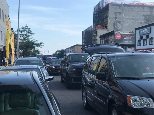 Four cars double parked on Coney Island Avenue. Photo by Dave Colon
