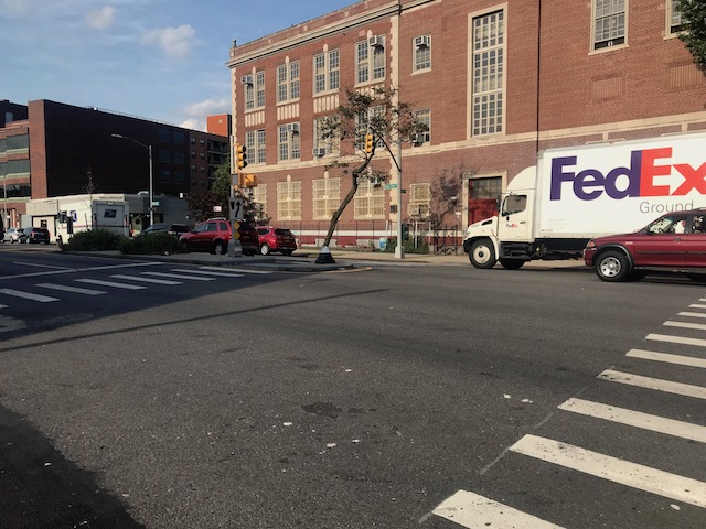 The intersection of Roder Avenue and Coney Island Avenue, where the DOT added a pedestrian island, is a more welcoming environment for anyone not in a car or truck. Photo by Dave Colon