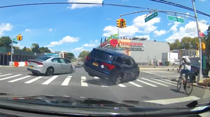 This is a split second before Jose Alzorriz (right) was killed just waiting for a light.