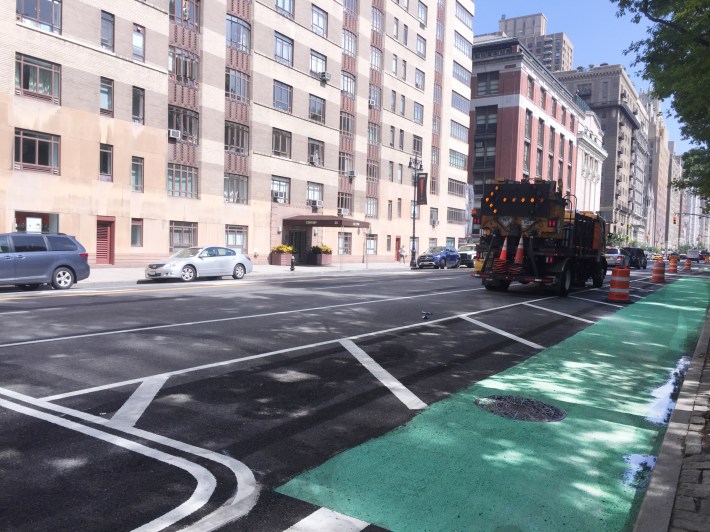 The Central Park West protected bike lane, as it appears in front of 25 Central Park West, whose residents are suing the city to stop construction. A motion on the suit will be heard August 20. Photo: Gersh Kuntzman