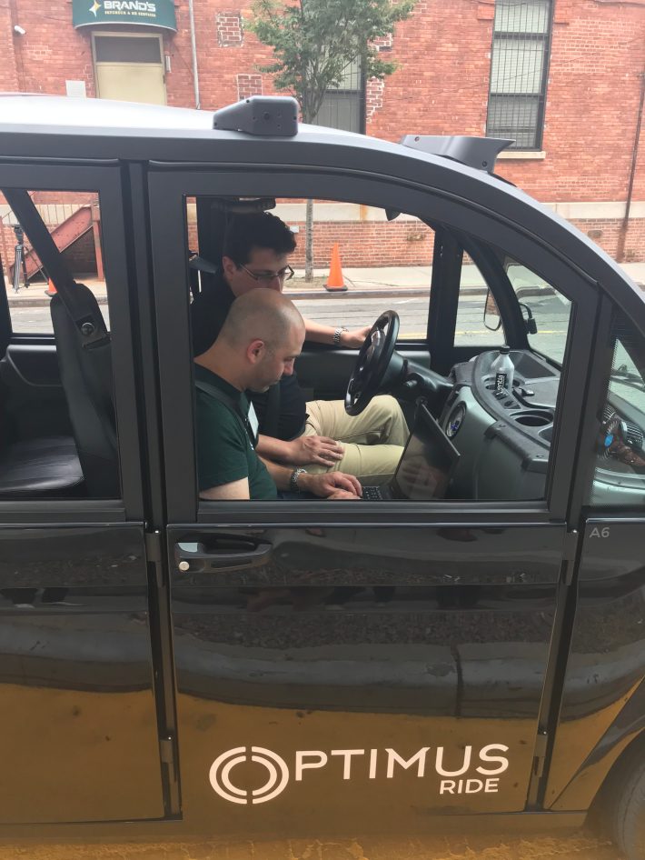 The safety operator and engineer inside the so-called driverless car. Photo: Julianne Cuba