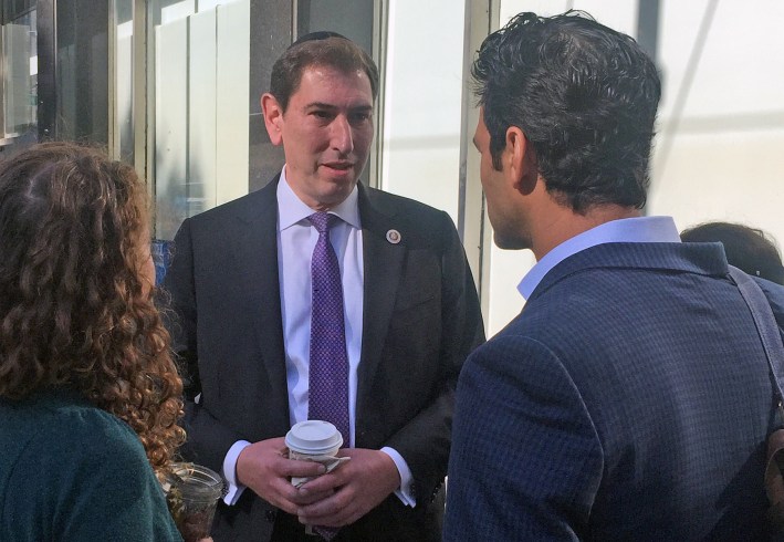 Council Member Chaim Deutsch talking to transportation activists last week — the first day he took the subway to work. Gersh Kuntzman.