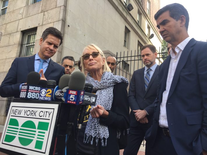 Mary Beth Kelly, whose husband was killed by a driver on the West Side Highway, shut down questions by TV reporters who were complaining about reduced car speeds on the roadway. Photo: Gersh Kuntzman