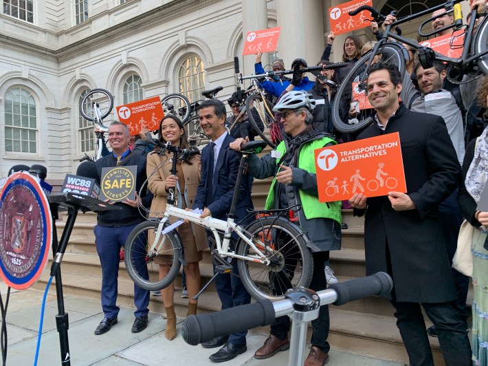 Council Members Ydanis Rodriguez and Carlina Rivera celebrated the introduction of their bike mayor and pedestrian mayor bills with an old-fashioned bike lift. Photo: Gersh Kuntzman