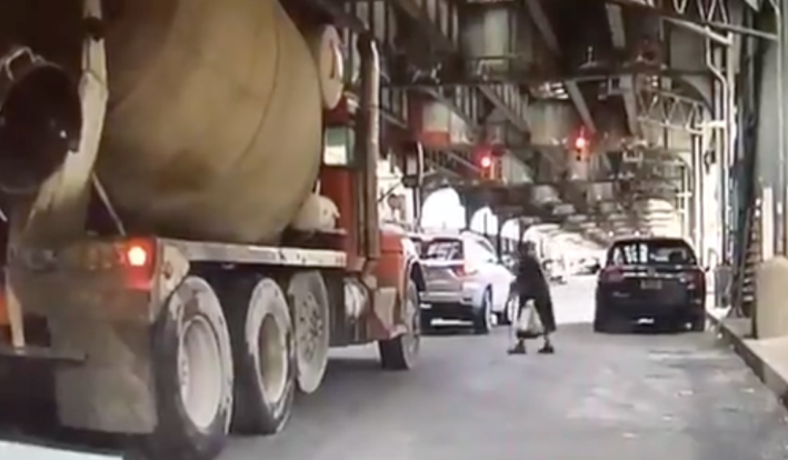 A sensor could have alerted the driver of this massive cement truck that the woman was right in front of it.