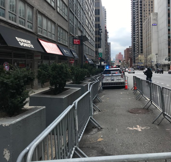 One gap on Second Avenue that will never be fixed because the NYPD has a constant presence in front of an office building housing a sensitive national U.N. mission. Photo: Julianne Cuba