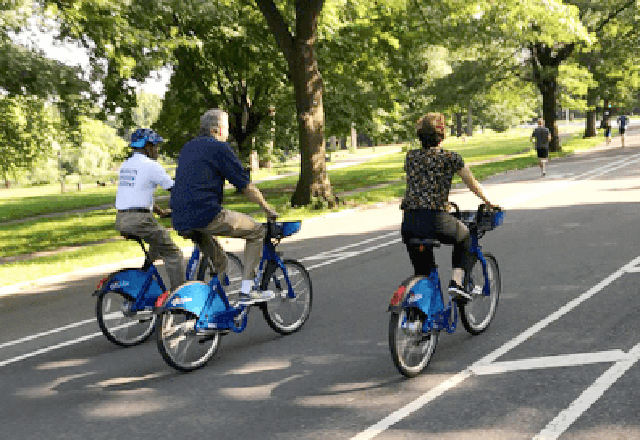 Mayor de Blasio (center with Borough President Eric Adams and DOT Commissioner Polly Trottenberg) was last seen riding a bike in August, 2018. Photo: Natalie Grybauskas