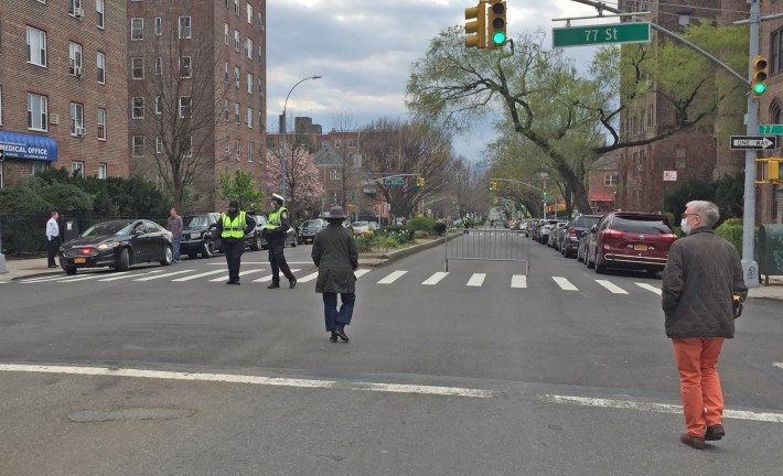 Does this experiment really need so many cops? This is 34th Avenue in Jackson Heights on Sunday. Photo: Angela Stach