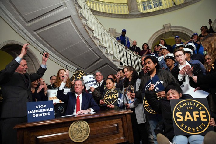 That was then. Council Member Brad Lander (left) celebrated with Mayor de Blasio in late February when Hizzoner signed the Reckless Vehicle Abatement Program. Photo: Mayor's office