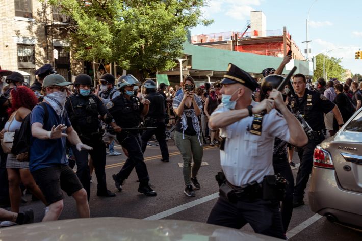 The police charged a largely peaceful crowd as it tried to continue marching. Photo: Kel Bush