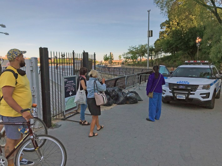 Looking south, the NYPD barricades inside Carl Schurtz Park confused pedestrians and riders who had just exited the ferry and wanted to walk south. Photo: Steven Vago