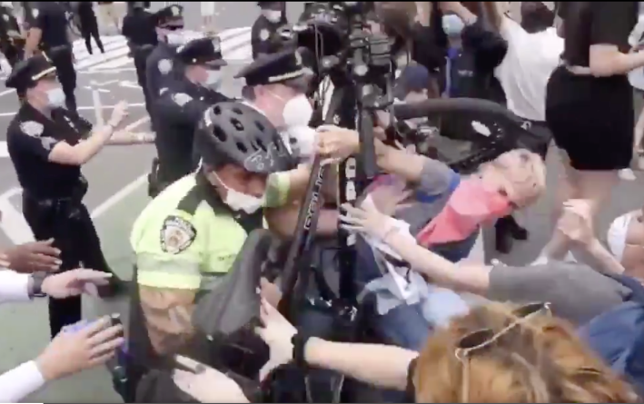 Police using their bicycles as weapons against protesters in Union Square. Source: Twitter