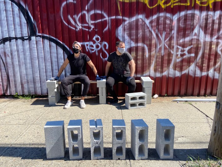 Using portable seating in Red Hook.