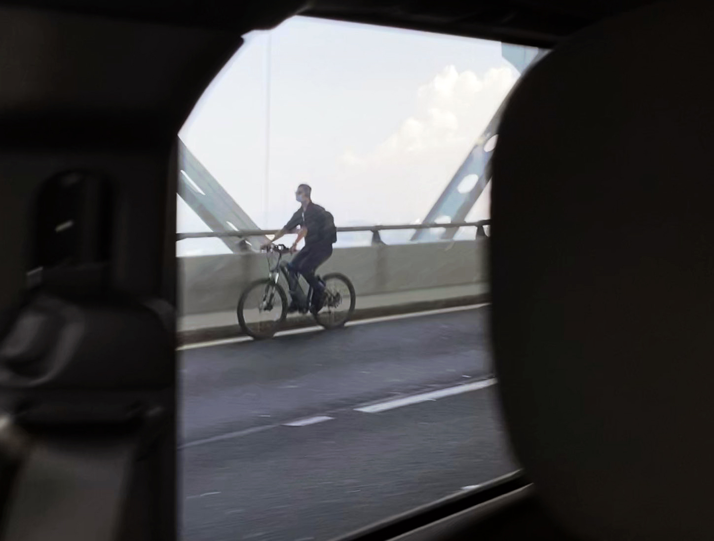 Unidentified Verrazzano Bridge Cyclist Points the Way to What the