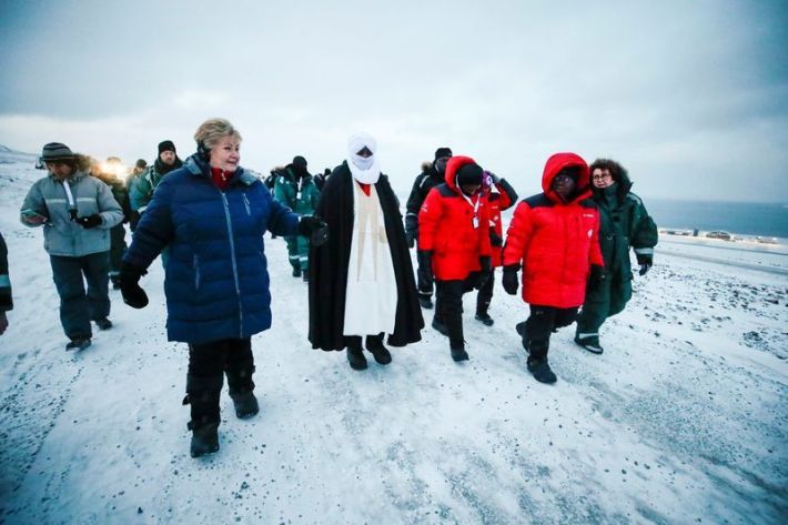 Here's Norway's Prime Minister Erna Solberg (left in blue coat) quite possibly looking for a nice place for a picnic. Photo: NTB Scanpix/Lise Aserud via REUTERS