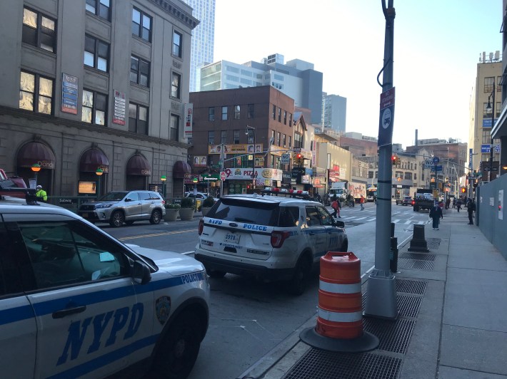 Death, taxes and the NYPD parking in bus stops. Photo: Dave Colon