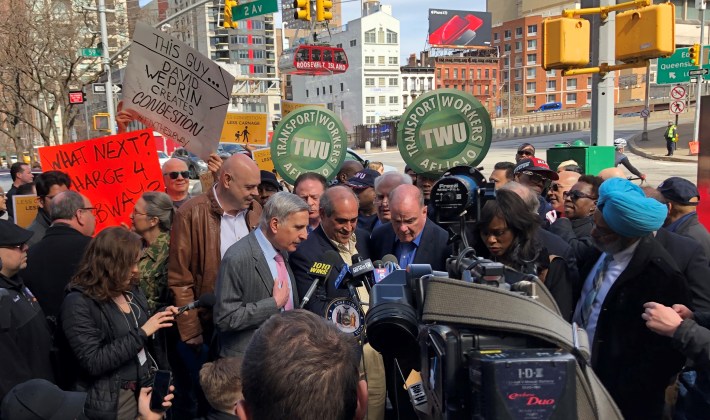 Queens Assembly Member David Weprin (maroon tie near 1010 WINS mic) at the March 24, 2019 rally to oppose congestion pricing. Despite the efforts of Weprin and others, the budget bill mandating congestion pricing passed, with TWU support, a week later. Photo: Charles Komanoff