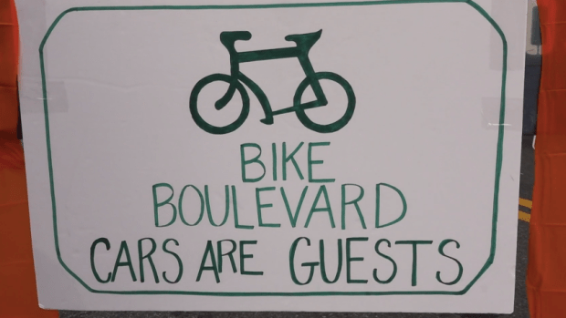 One of the signs displayed at the StreetopiaUWS bike boulevard demonstration project in 2020.