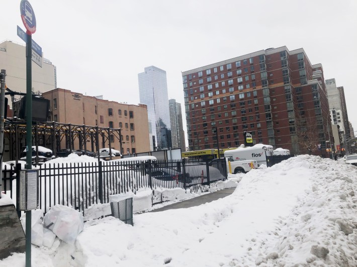 A bus stop full of snow, days after the blizzard. Photo: Christine Berthet