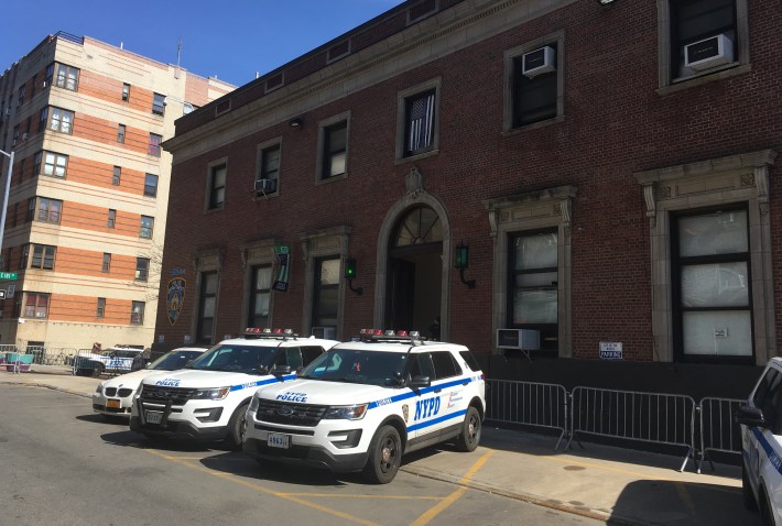 Cop cruiser city: the front entrance of the 46th is heavy on SUVs. Photo: Eve Kessler