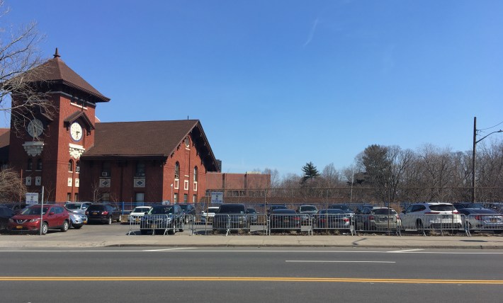 Plenty of room for officers' cars in the 52nd Precinct parking lot. Yet the cars overflow. Photo: Eve Kessler