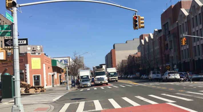 Motorists block the bus lane directly across the street from the 52nd Precinct on Webster Avenue in the Bronx. Photo: Eve Kessler