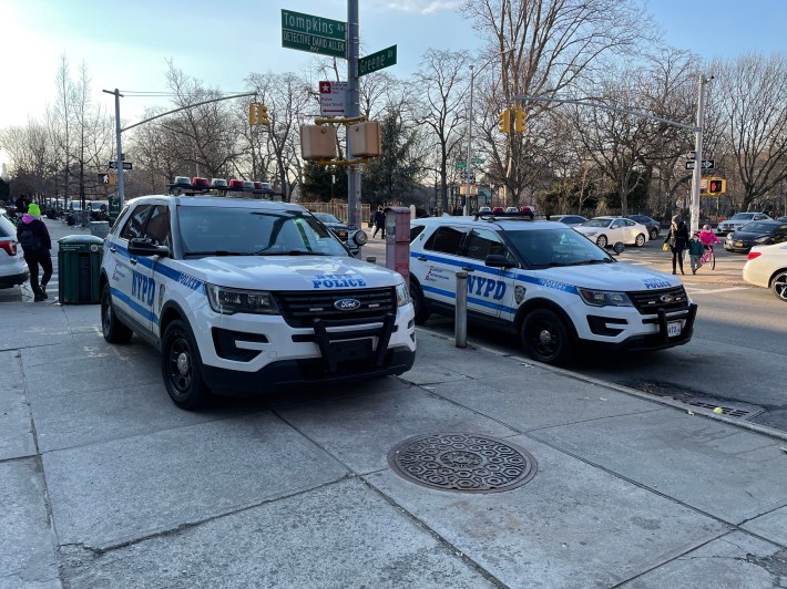 A police SUV parked on the corner of Greene Avenue and Tompkins Avenue, despite the nearby police parking lot. Photo: Dave Colon
