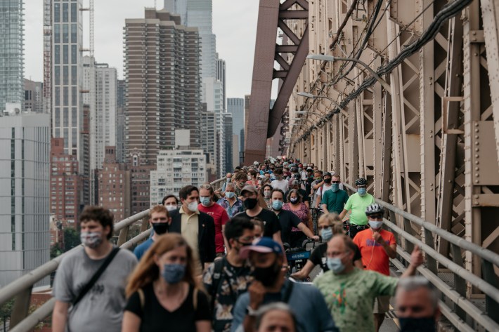 Advocates were tired of waiting for #MoreSpaceQBB on the Queensboro Bridge South Outer Roadway and marched to demand it be turned into a pedestrian space. Photo: TransAlt