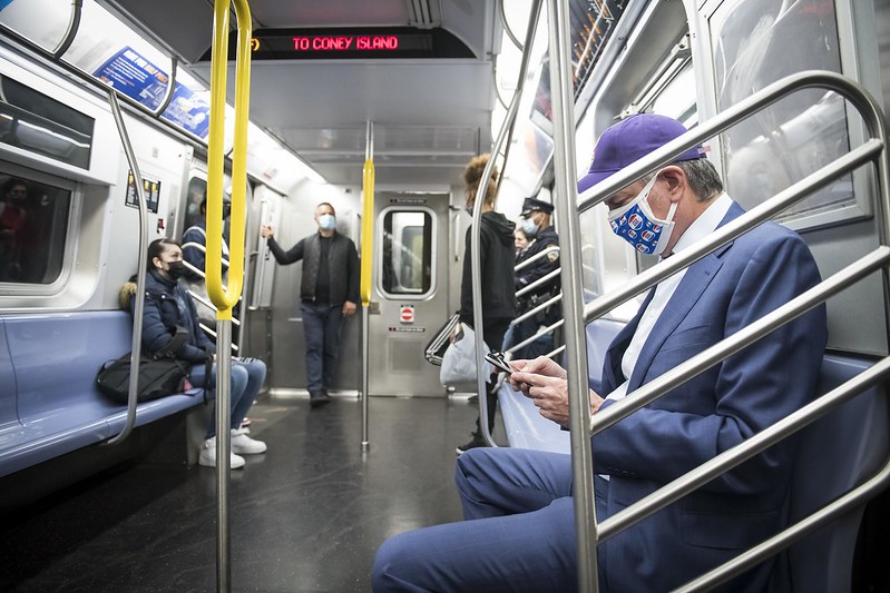Mayor Bill de Blasio wears a blue suit and baseball cap and rides the F Train from Manhattan to Brooklyn. Wednesday, May 12, 2021.