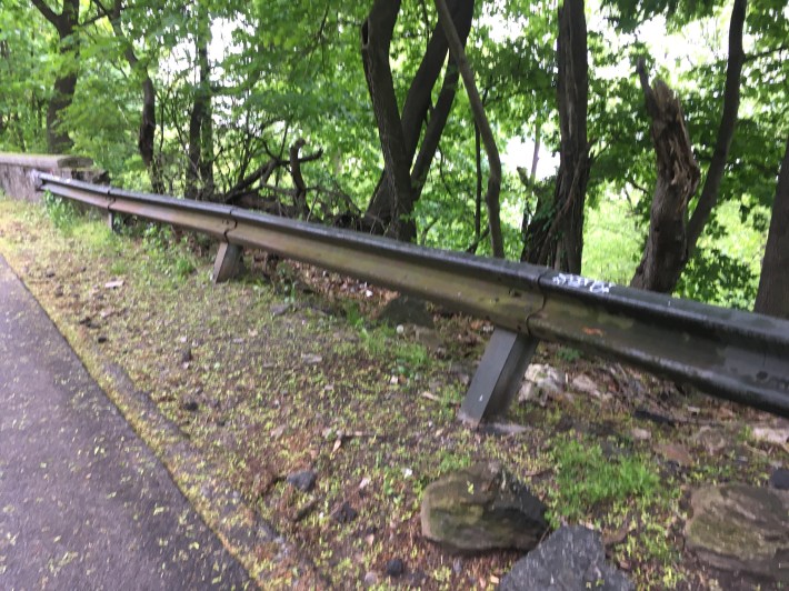 A rickety fence guards a collapsed section of the Hudson River Greenway retaining wall. Photo: Eve Kessler