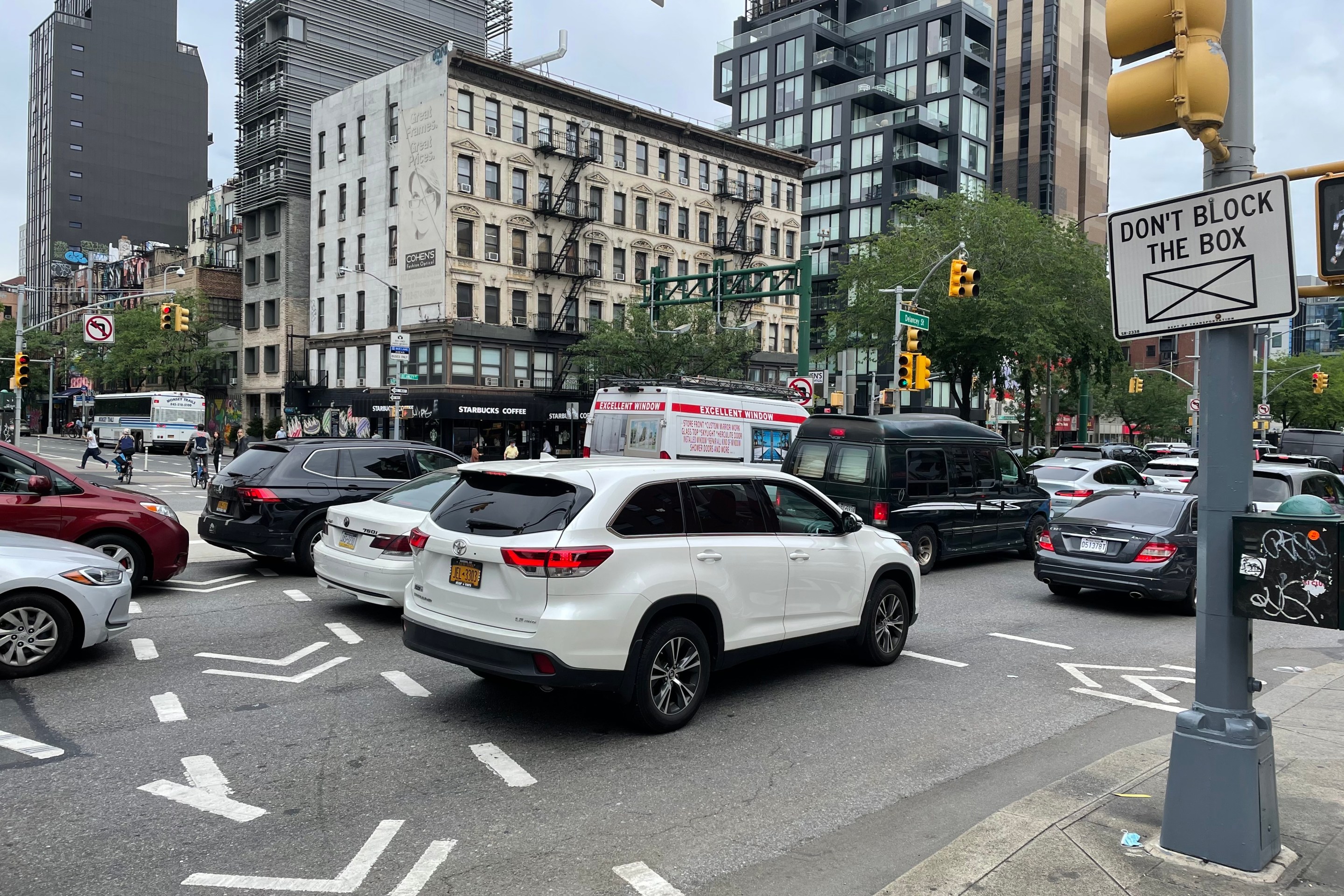 Cars block the intersection in a traffic jam on Delancey Street.